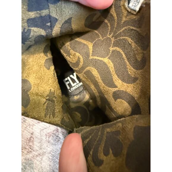 Amazon.com | Fly London Women FLY LONDON Baan Black Heeled Ankle Booties (Wedge), Size EU 37 / US 7 (MP $269)